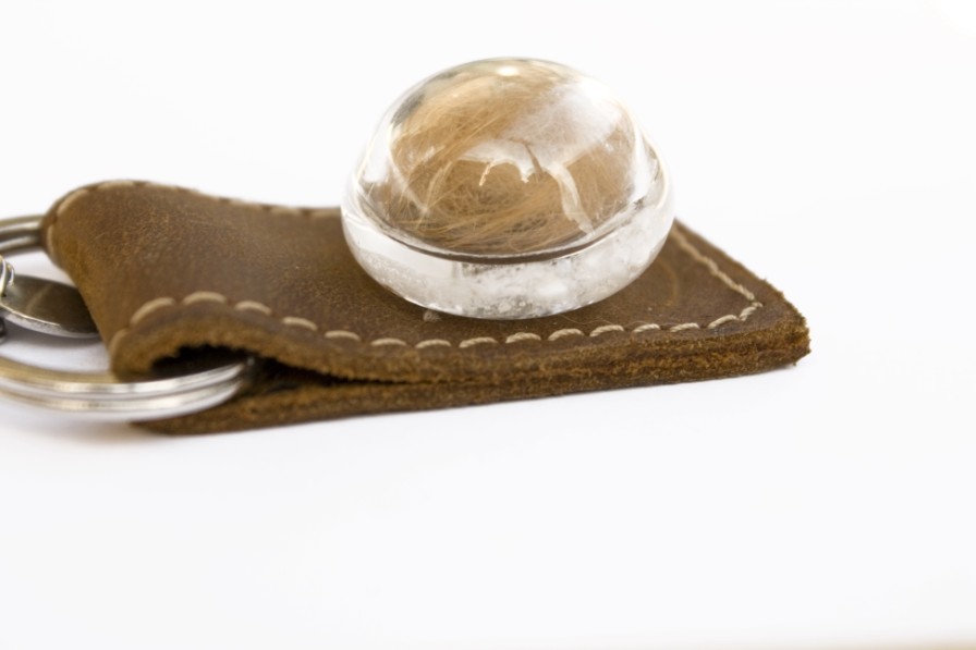 Sleutelhanger hol met as gesmolten en vacht